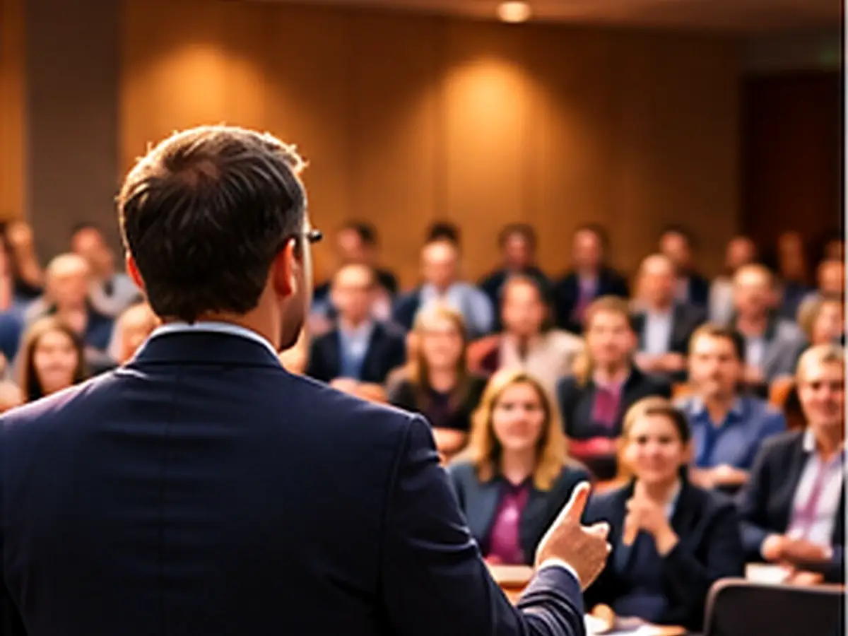 Presenter speaking to an audience