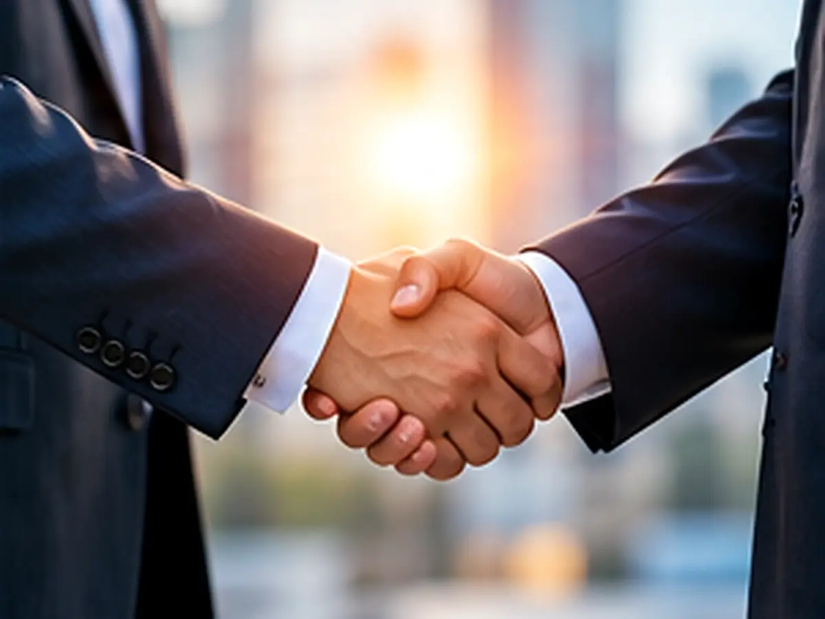 Business leaders shaking hands